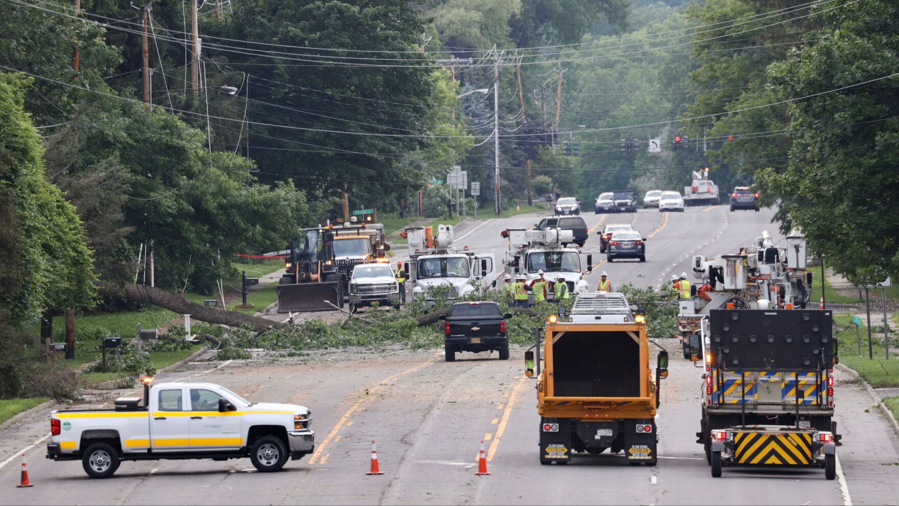 Storms bring down trees and power lines; some house damage reported ...