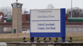 The guard tower flanks the sign at the entrance to the U.S. Penitentiary in Terre Haute, Ind., in Terre Haute, Ind., Tuesday, Dec. 10, 2019. The facility houses a Special Confinement Unit for male federal inmates who have been sentenced to death as well as the federal execution chamber.