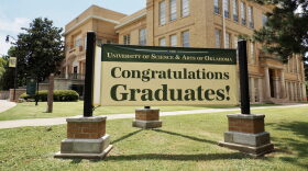 A sign outside of Troutt Hall on the University of Science and Arts of Oklahoma campus congratulates graduates on July 10, 2024, in Chickasha.