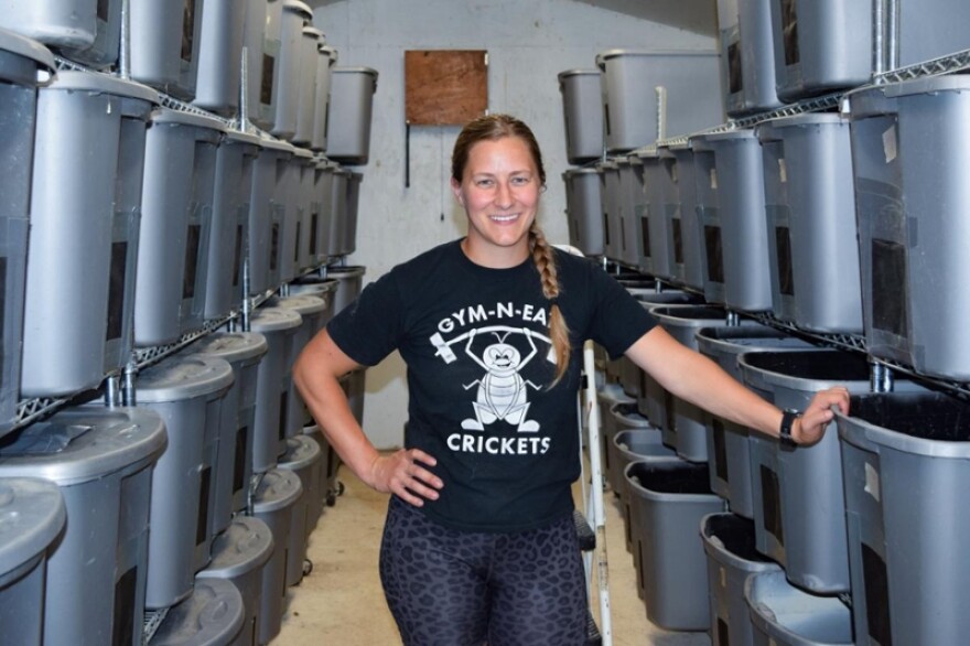 Shelby Smith wearing a Gym-N-Eat Crickets T-shirt