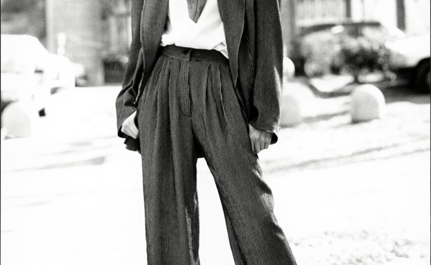 A model wears an Emporio Armani suit at a Paris fashion show in 1989.