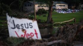 FILE - Campers' belongings sit outside one of Camp Mystic's cabins near the Guadalupe River, Monday, July 7, 2025, in Hunt, Texas, after a flash flood swept through the area. (AP Photo/Eli Hartman, File)