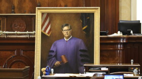 A portrait of former South Carolina House Speaker Jay Lucas sits in the House chamber after being unveiled on Tuesday, April 25, 2023, in Columbia, S.C. (AP Photo/Jeffrey Collins)