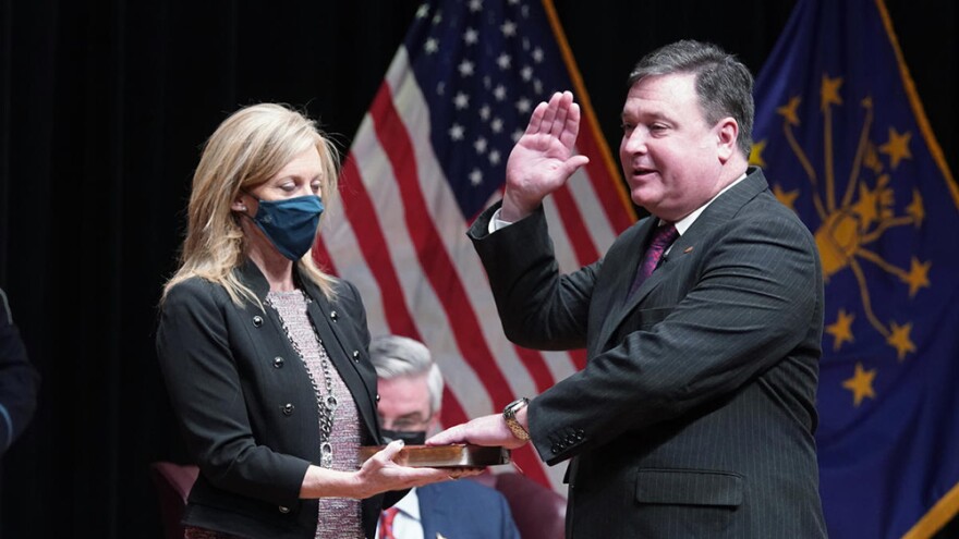 Todd Rokita, alongside his wife Kathy, is sworn in as Indiana's new attorney general.