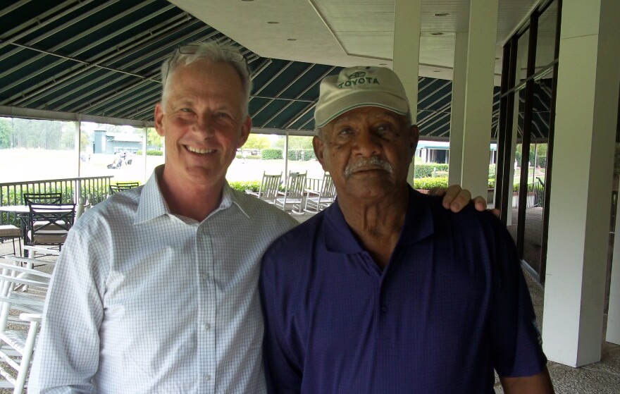 Willie McRae (right) with reporter Dick Gordon.