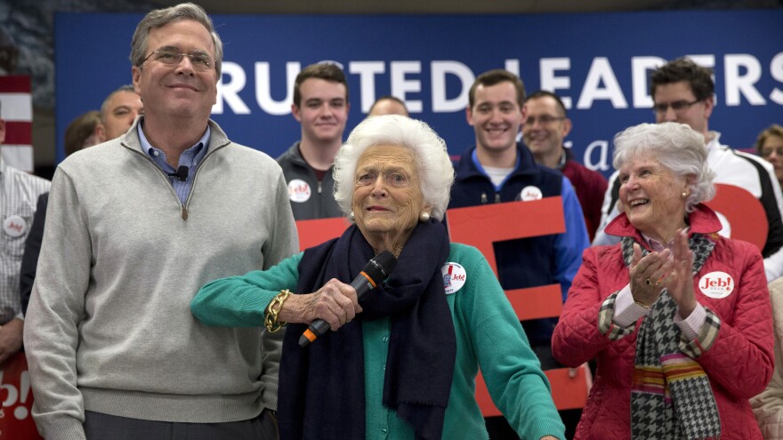 Barbara Bush jokes with her son, Republican presidential candidate Jeb Bush, while introducing him at a town hall meeting in Derry, N.H.