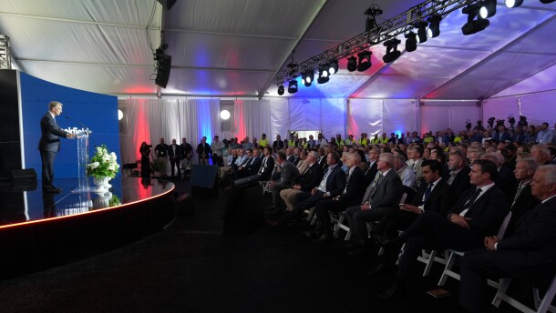 Brookfield CEO Bruce Flatt addresses the crowd in a tent at the former Paducah Gaseous Diffusion Plant site.
