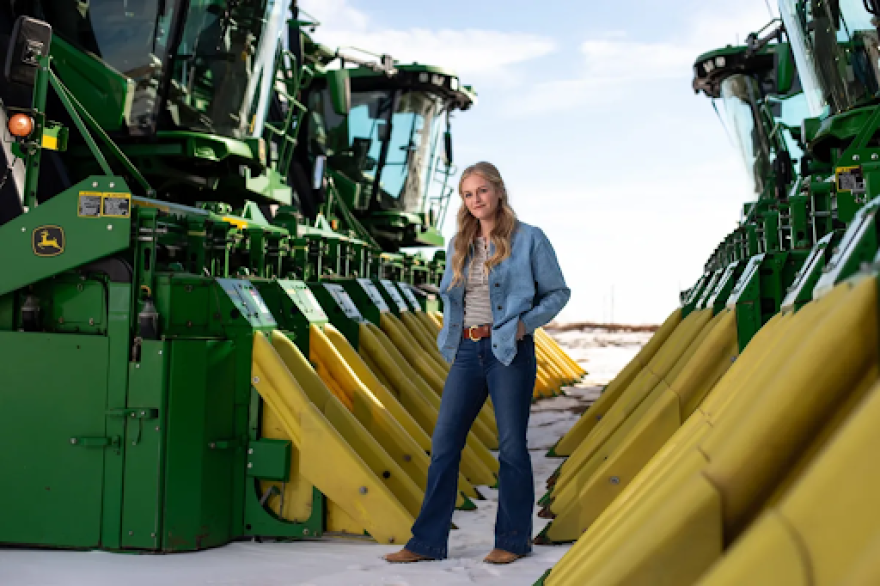 Altus cotton farmer Charlcey Plummer poses with her combines on Jan. 28, 2025.