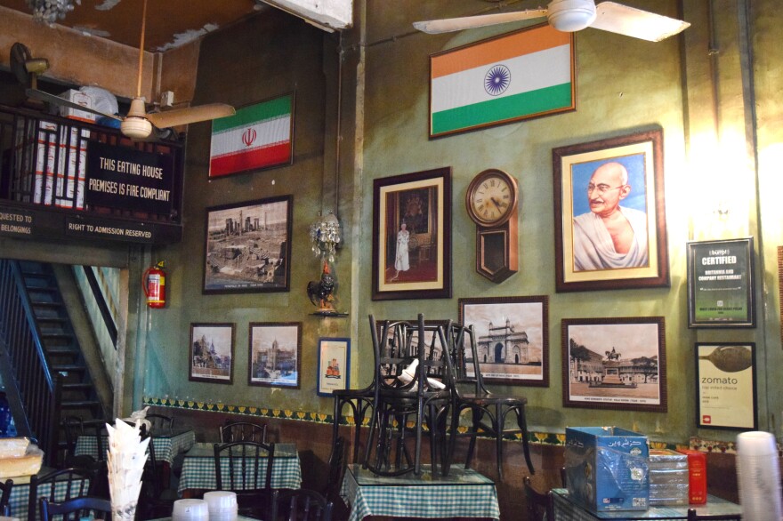 On one wall of Britannia & Co. is a portrait of Queen Elizabeth II. Next to her is a painting of Gandhi. Each serves as a reminder of the cafe's unique cultural heritage.