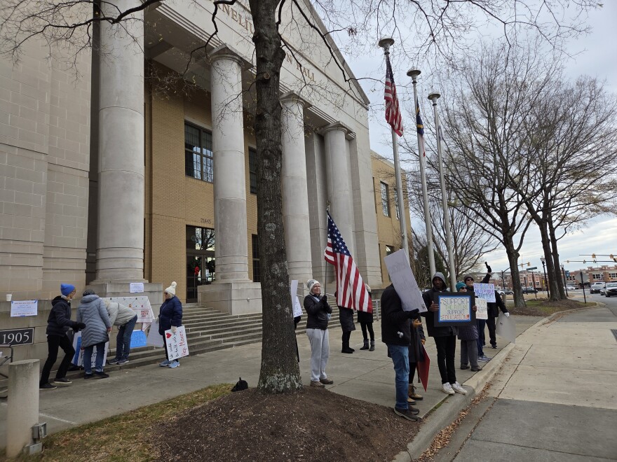 Education advocates rally for the IDEA outside U.S. Rep. Tim Moore's office at Cornelius Town Hall.