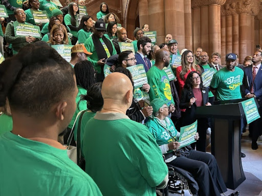 People rally to 'Fix Tier VI" at the State Capitol.