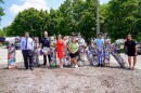 Akron Mayor Shammas Malik, Akron Police Deputy Chief and KAB Vice Chair of the Board Dave Laughlin, Ward 9 Councilwoman Tina Boyes, member of Friends of Prentiss Park Kyla McPhillamy, APS student Khyr’anna Louis, APS student Jayd Foxworth and Executive Director of Keep Akron Beautiful Jacqui Ricchiuti at the unveiling in Prentiss Park on July 9, 2026.