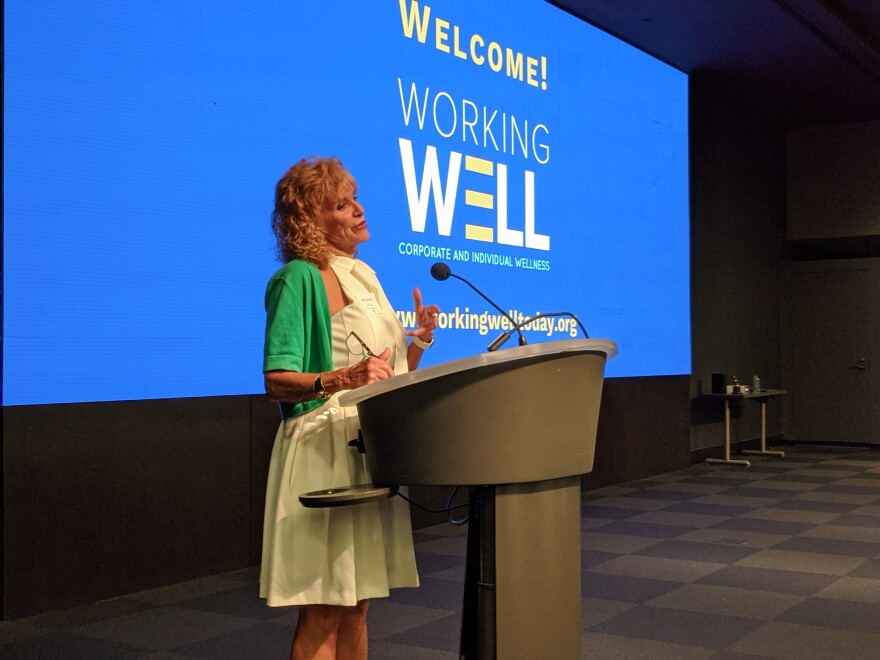 Mary Barley, Leon County's Health and Well-Being Coordinator, welcomes the Working Well Breakfast attendees.