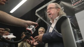 James Allison, one of the 2018 Nobel Prize winners for medicine, speaks to members of the media Monday, Oct. 1, 2018, in New York. Allison and Tasuku Honjo won the Nobel Prize in medicine on Monday for discoveries that help the body marshal its cellular troops to attack invading cancers. (AP Photo/Bebeto Matthews)