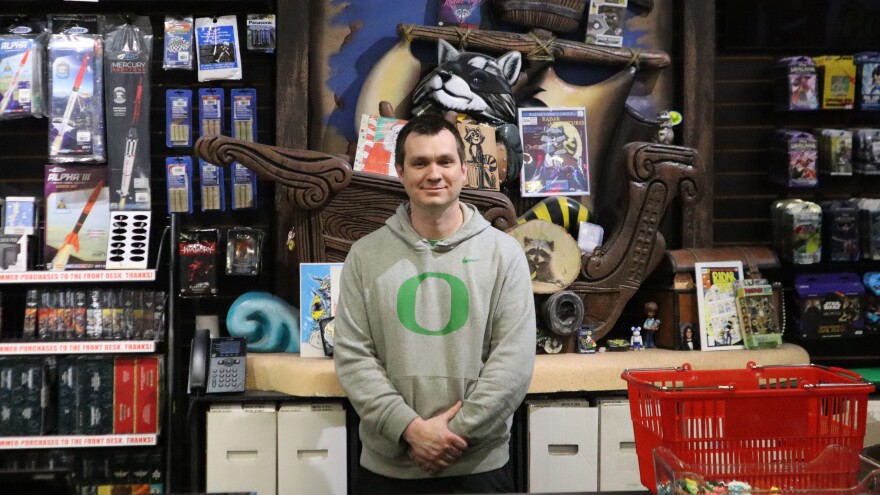 Richard Goosman stands behind the counter at Radar Toys in this December 2025 picture