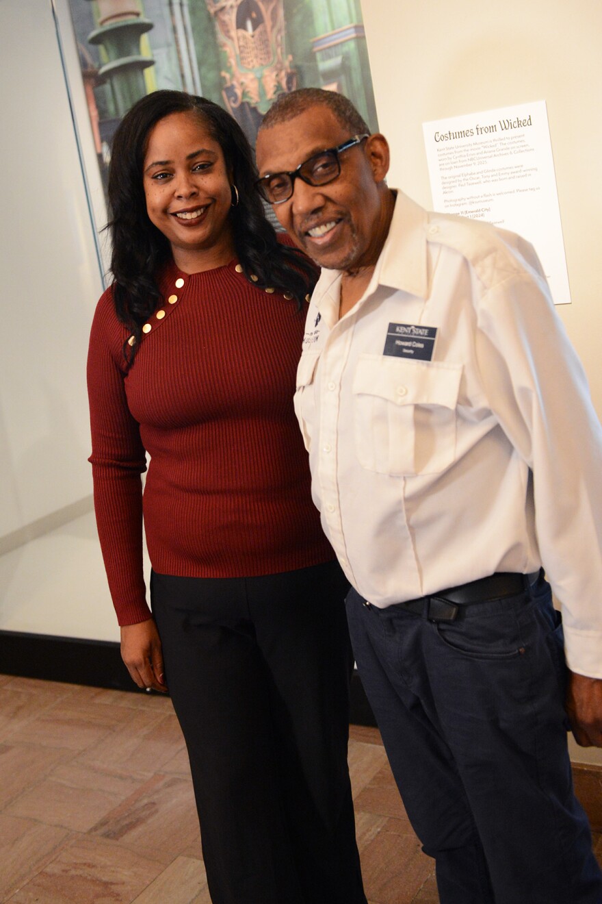 A woman and man pose together