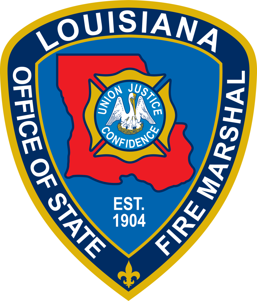 Shield of the Louisiana State Fire Marshall, It contains Louisiana and a White Pelican with fire emblems