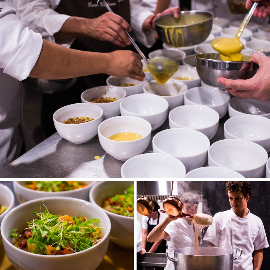 Cooks prepare dinner at the RefettoRio Gastromotiva's kitchen.