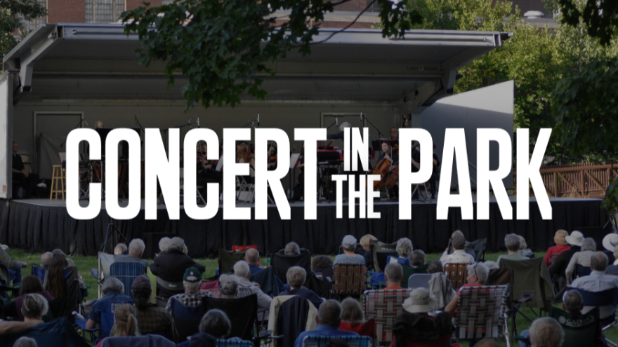 Text reading “Concert in the Park” overlayed on a picture of people sitting in lawn chairs in front of an outdoor stage