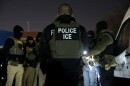 FILE - U.S. Immigration and Customs Enforcement officers gather for a briefing before an enforcement operation, Jan. 27, 2025, in Silver Spring, Md.