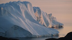 A massive iceberg stands at the mouth of the Ilulissat Icefjord during a week of unseasonably warm weather on Aug. 4, 2019 near Ilulissat, Greenland. (Sean Gallup/Getty Images)