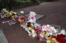 An impromptu memorial of flowers and other items laid near the center of the Florida State campus in sight of the Student Union building, Tallahassee, Fla., Thursday, April 17, 2025. 