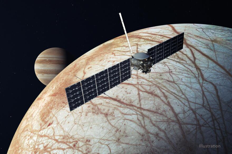 This illustration, updated in December 2020, depicts NASA's Europa Clipper spacecraft near Jupiter's moon, Europa.