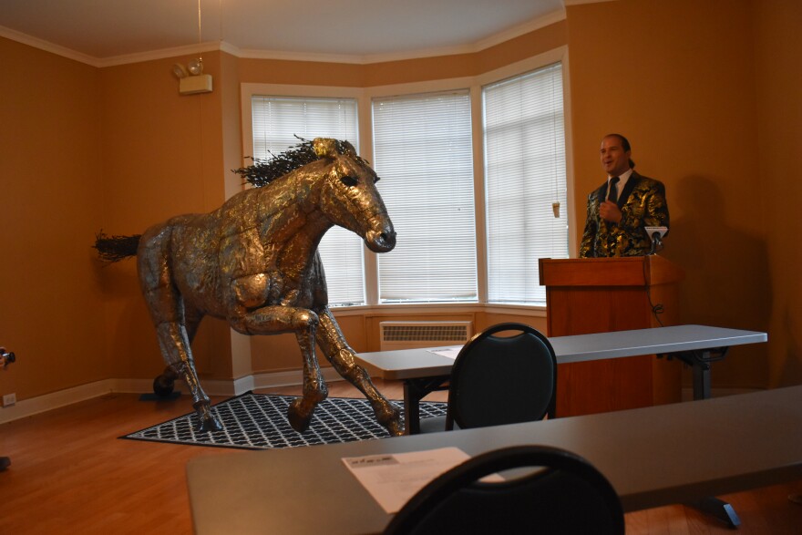 "Monte de Gallo," aka Nic di Caro, announces his plans for a "Safari Art Park" centered around his sculptures in West Peoria on Sunday, July 19, 2020.