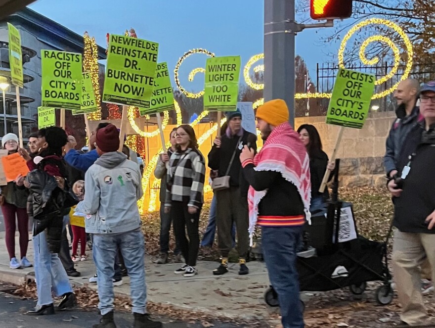 Protestors outside Newfields.