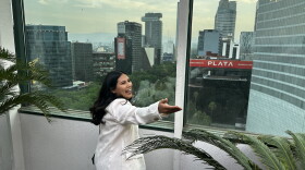 Luz Galaviz ushers a friend toward a window at the Sheraton Maria Isabel Hotel in Mexico City on May 28, 2024. She is participating in the Civic Leader Education and Advocacy Program with Voces Unidas, a nonprofit organization based in Glenwood Springs, Colorado.