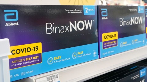Boxes of BinaxNow home COVID-19 tests made by Abbott are shown for sale Monday, Nov. 15, 2021, at a CVS store in Lakewood, Wash., south of Seattle.