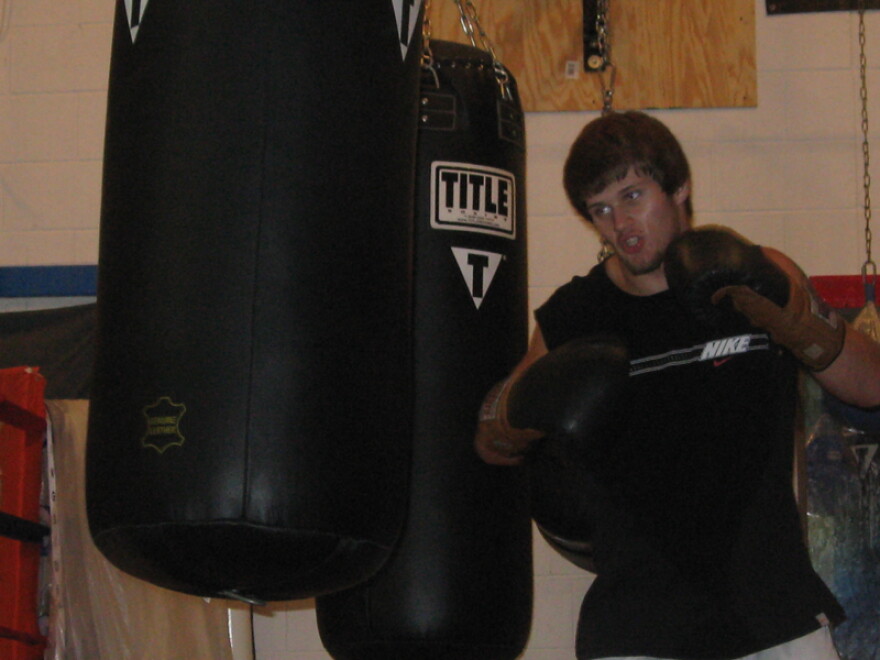 Clinton Phifer works out at the Atkins Porter Gym in Paris, Tenn. He's a three-time national champion and won the Ringside World Championship in 2009. He returns to Ringside August 2 with four other athletes from the Henry County Boxing Club.