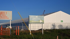 A sign directs drivers to the construction entrance for Google's Project Scissortail in Muskogee County. Google announced in late 2025 it was behind the new infrastructure.