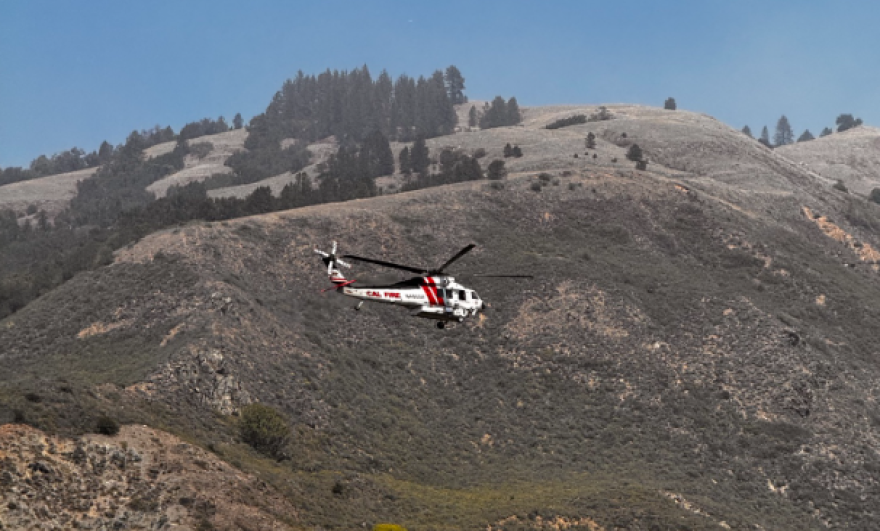 Cal Fire helicopter heads to Plaskett Fire.