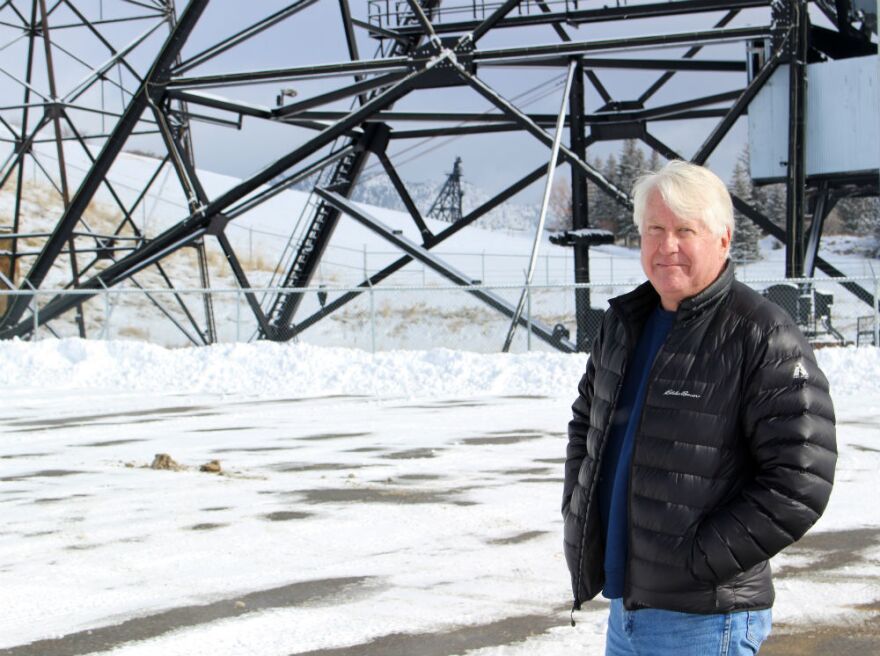 Walter Hinick, former staff photographer for the Montana Standard, stands next to the Mountain Con Mine in Butte in February 2018.