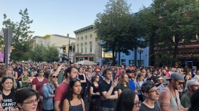 Thousands fill Fifth St. in the quater-mile stretch of business and entertainment venues of the Oregon District for a vigil honoring the victims of the August mass shooting. 