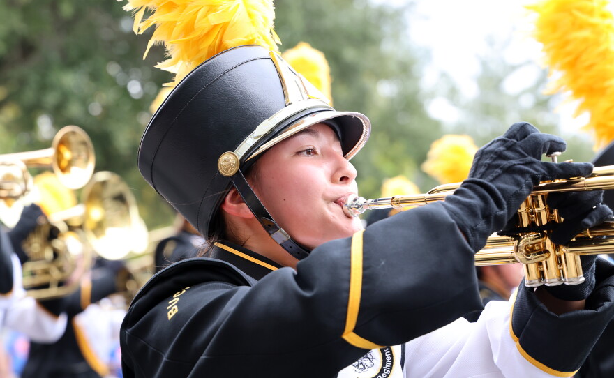A Buchholz High School Marching Band trumpeter plays during the University of Florida Homecoming parade in Gainesville Friday, Oct. 9, 2026. (Isabel Kraby/WUFT News)