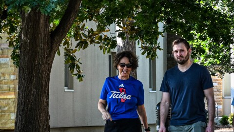 University of Tulsa President Stacy Leeds (left) walks beside Assistant Clinical Professor of Law Alexander Gavern, J.D. during the first routine Wednesday Walk and Leeds first day at the helm.