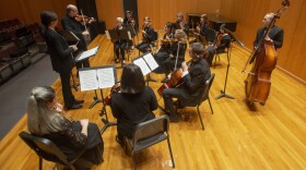 Dr. Leonid Yanovskiy, director of the UWF String Program, conducts the “Runge Strings” Orchestra as they rehearse for their upcoming performance at the University of West Florida.