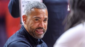 Texas Rio Grande Valley head coach Kahil Fennell talks with his team in the huddle during an NCAA college basketball game against Illinois, Monday, Nov. 24, 2025, in Champaign, Ill. (AP Photo/Craig Pessman)