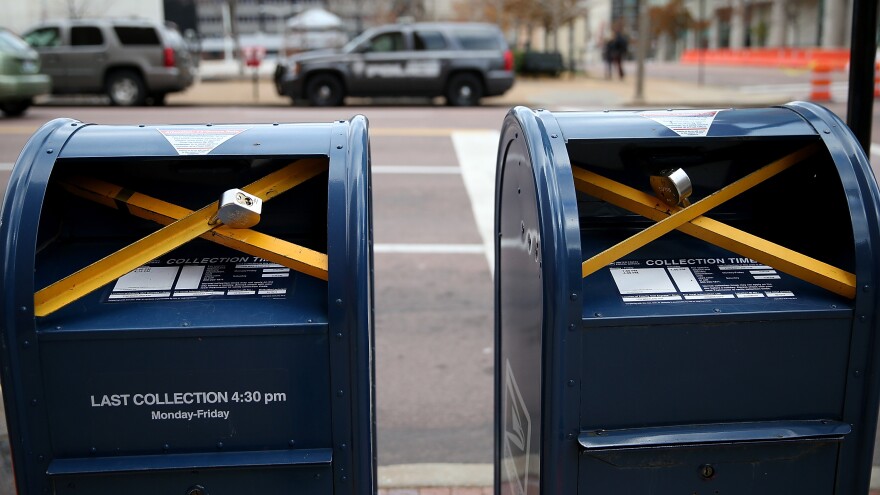 Locks were put on mailboxes across from the Buzz Westfall Justice Center in Clayton, Mo., Monday, in anticipation of the grand jury's decision.