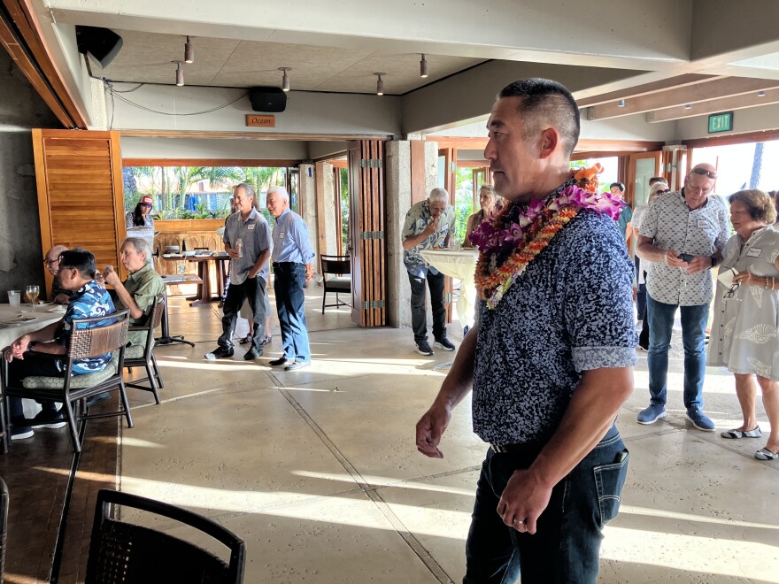 Derek Kawakami look out at a room at a meet-and-greet event in Waikīkī in Honolulu on June 29, 2026.
