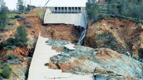 Ruins of the main spillway at Oroville Dam reveal a blend of "fresh" (blue-gray) rock and "weathered" (reddish-brown) rock underneath. (Calif. Dept. of Water Resources)