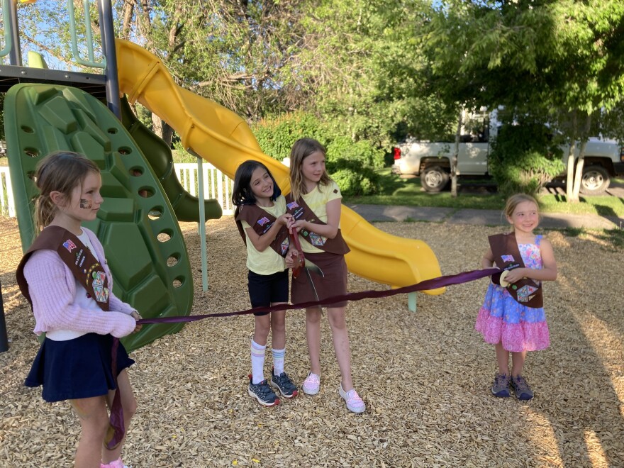 From left to right, Luna Beattie, Gwen DeRudder, Alma Rossello, and Georgia Owings prepare for a ribbon-cutting ceremony at Hendrick’s Park in Carbondale on June 20, 2023. The girls are members of Girl Scout Troop 17082 and helped choose a new design for the park when the Town of Carbondale was planning renovations.