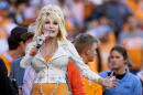 Dolly Parton performs during the first half of an NCAA college football game between Tennessee and Georgia Nov. 18, 2023, in Knoxville, Tennessee. (Wade Payne/AP)