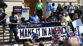 Employees who will lose their jobs at the Indianapolis Carrier factory stood at the front of Friday's rally with union members and Bernie Sanders supporters.