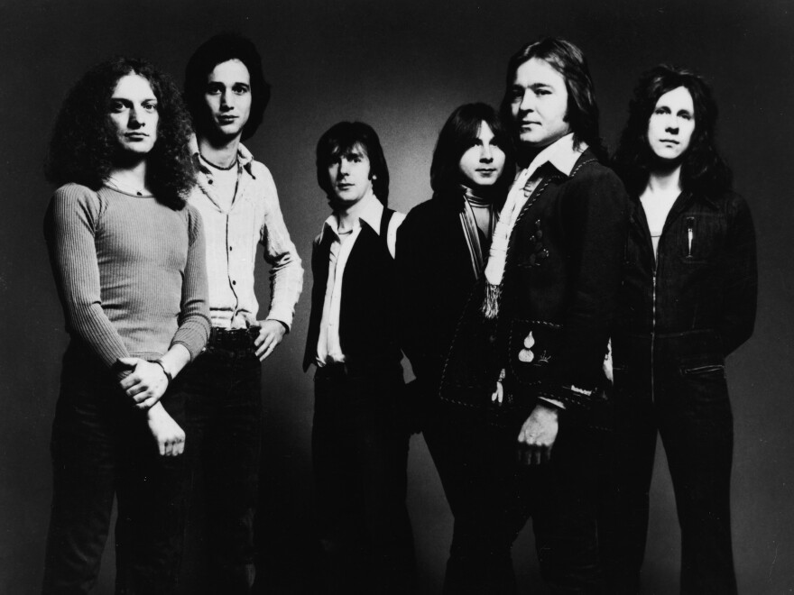 A 1977 promotional image of the band Foreigner, including (L-R): Lou Gramm, Ian McDonald, Al Greenwood, Mick Jones and Dennis Elliot. [Hulton Archive / Getty Images]