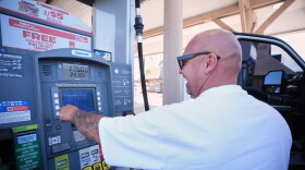 A man in a white T-shirt puts $175 of diesel in his truck at a gas station in Carlsbad, California on Thursday, Sept. 10, 2026.