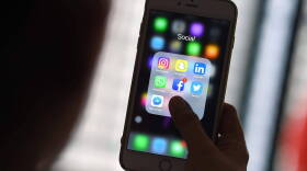 A report describes how social media platforms make it difficult for users to report dangerous online abuses. (Manan Vatsyayana/AFP via Getty Images)