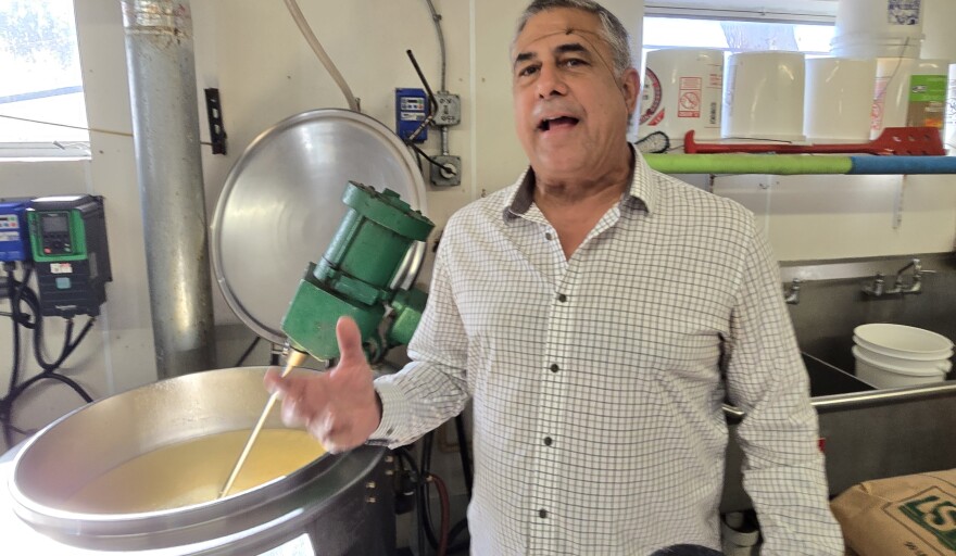 Jose Juarez, the BarbaCuban, mixes his '90 Miles to Mojo' marinade in his production kitchen in Ocala.